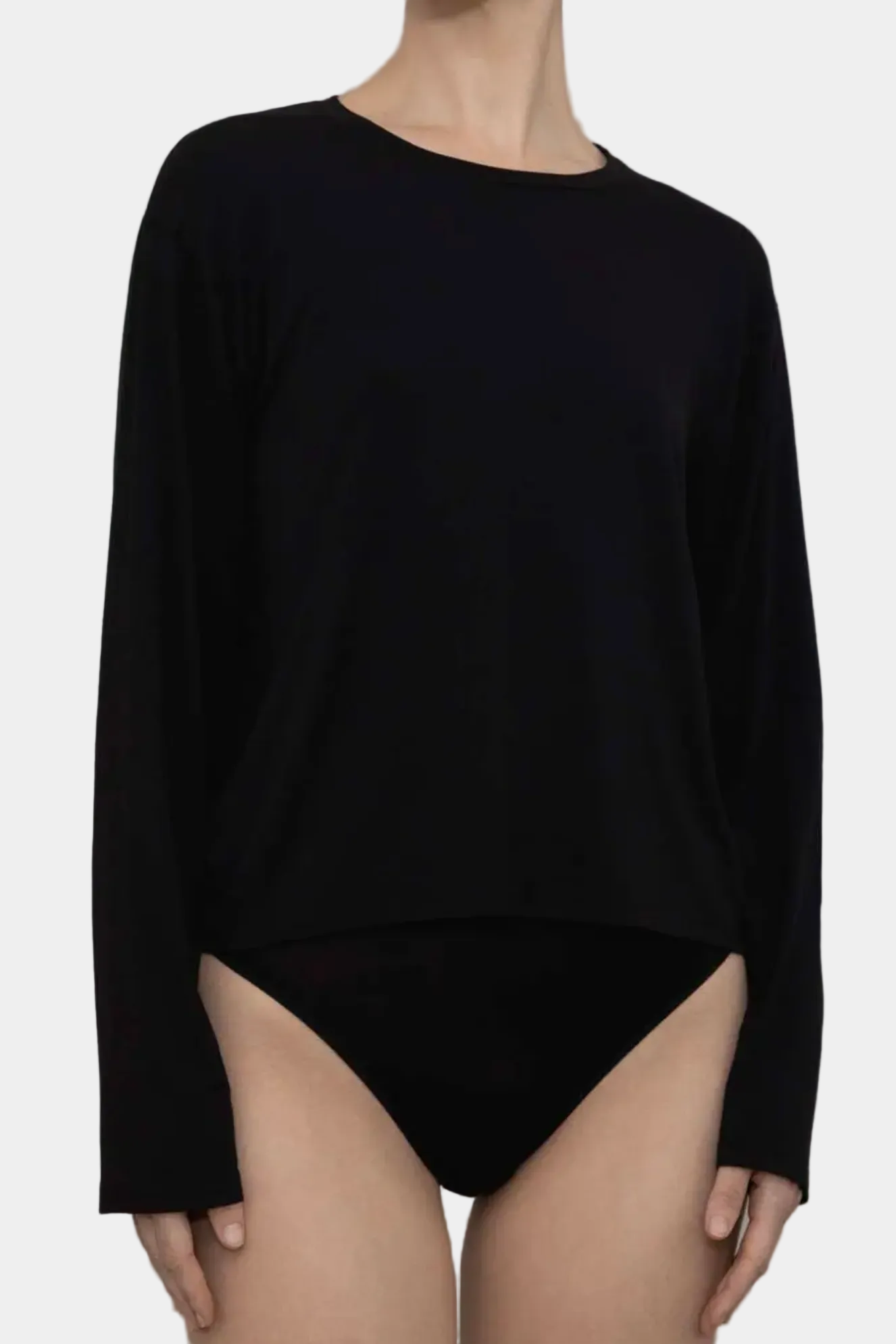 Model wearing KYE Intimates Relaxed Long Sleeve in Black slouchy bamboo top front view
