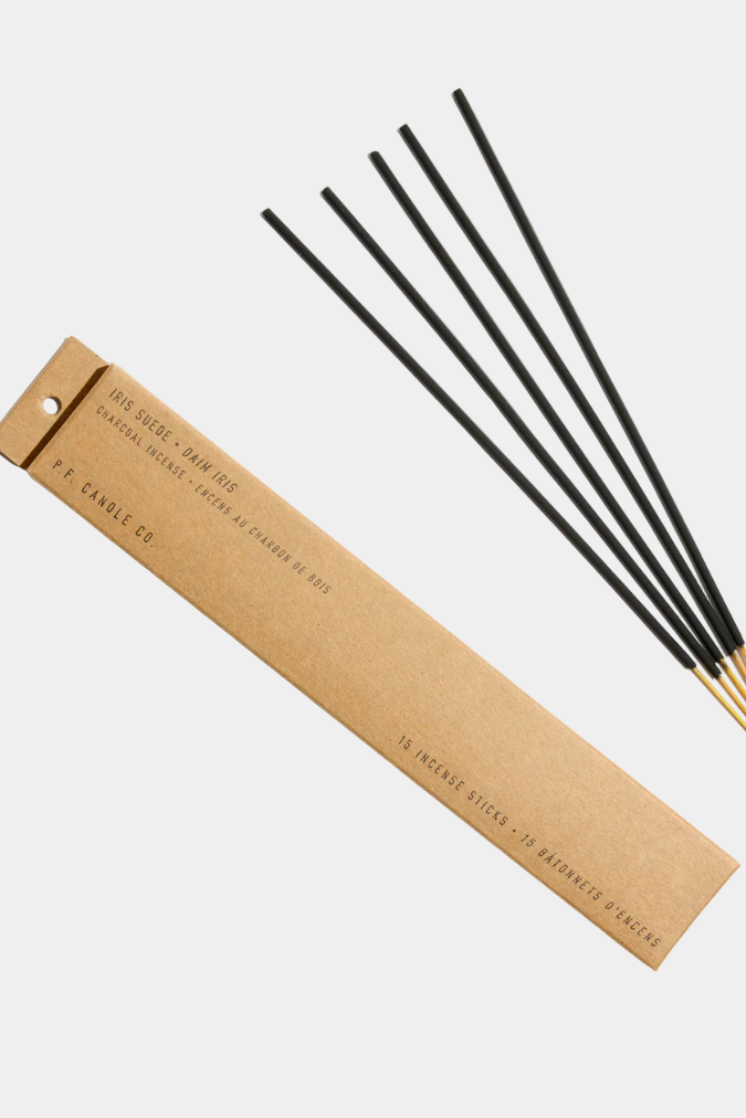 Set of incense sticks with a cardboard packaging on a white background
