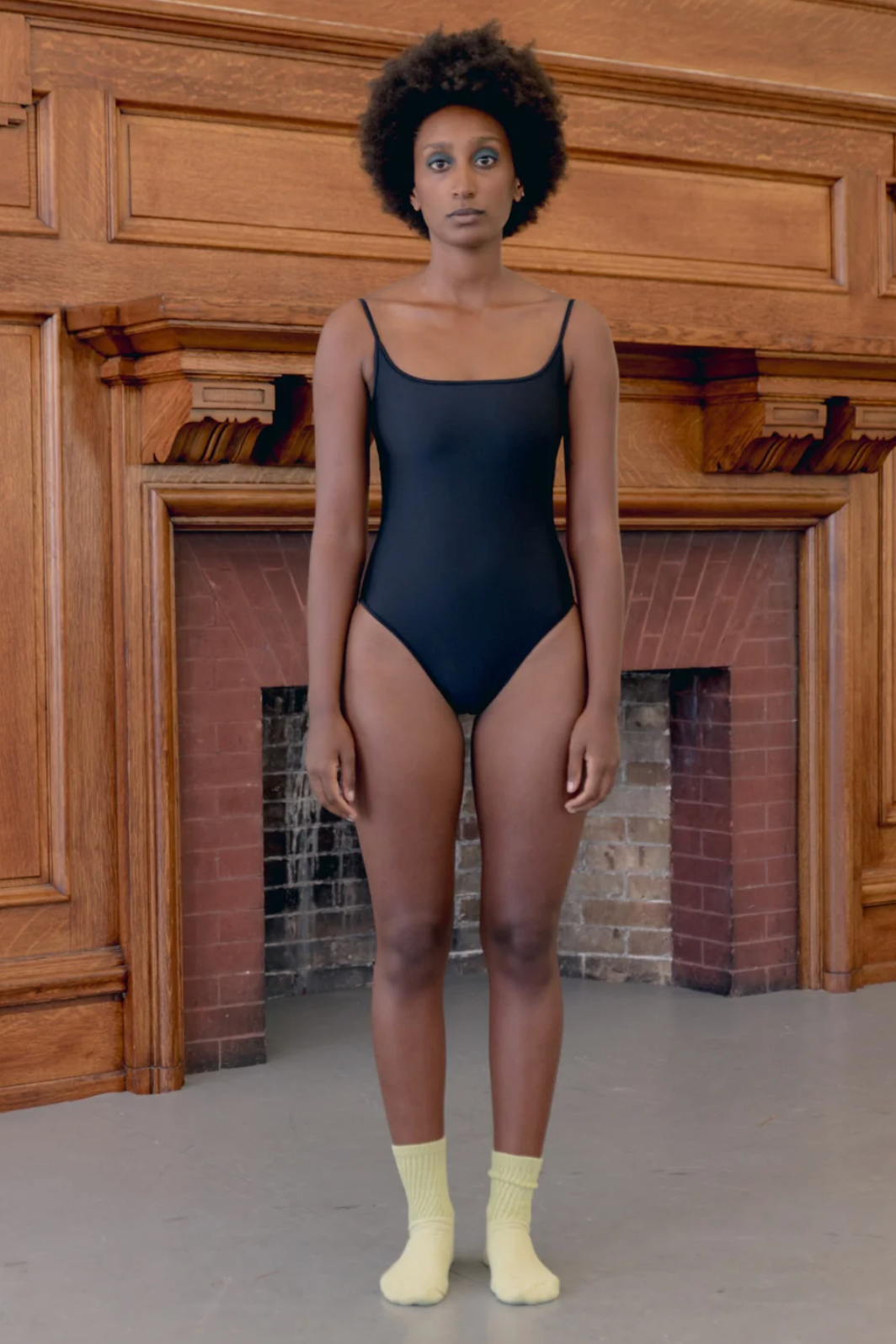 Front view of model wearing Nu Swim black Noodle Suit - East Coast Genera