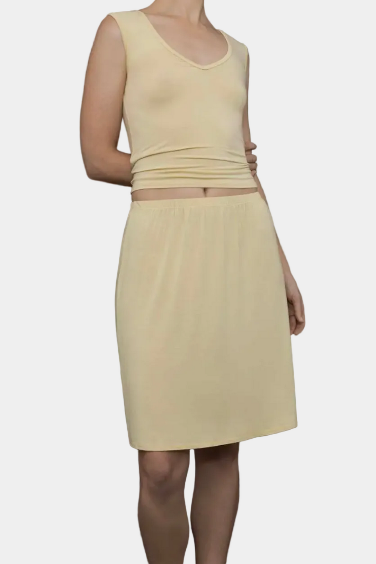 KYE Intimates Recline Skirt in Limoncello sheer bamboo jersey, viewed from the side - East Coast General