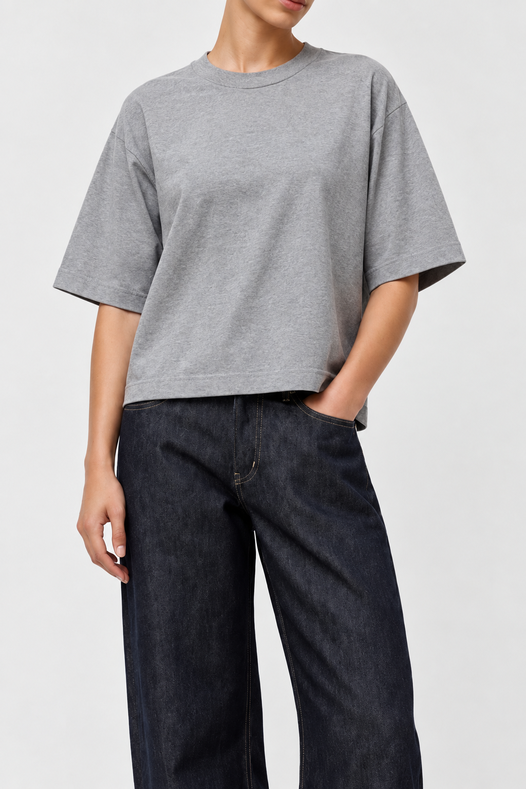Model wearing the Sunray Sportswear Mahuna T-shirt in Hambledon Grey and Bsides Floopy jeans - East Coast General