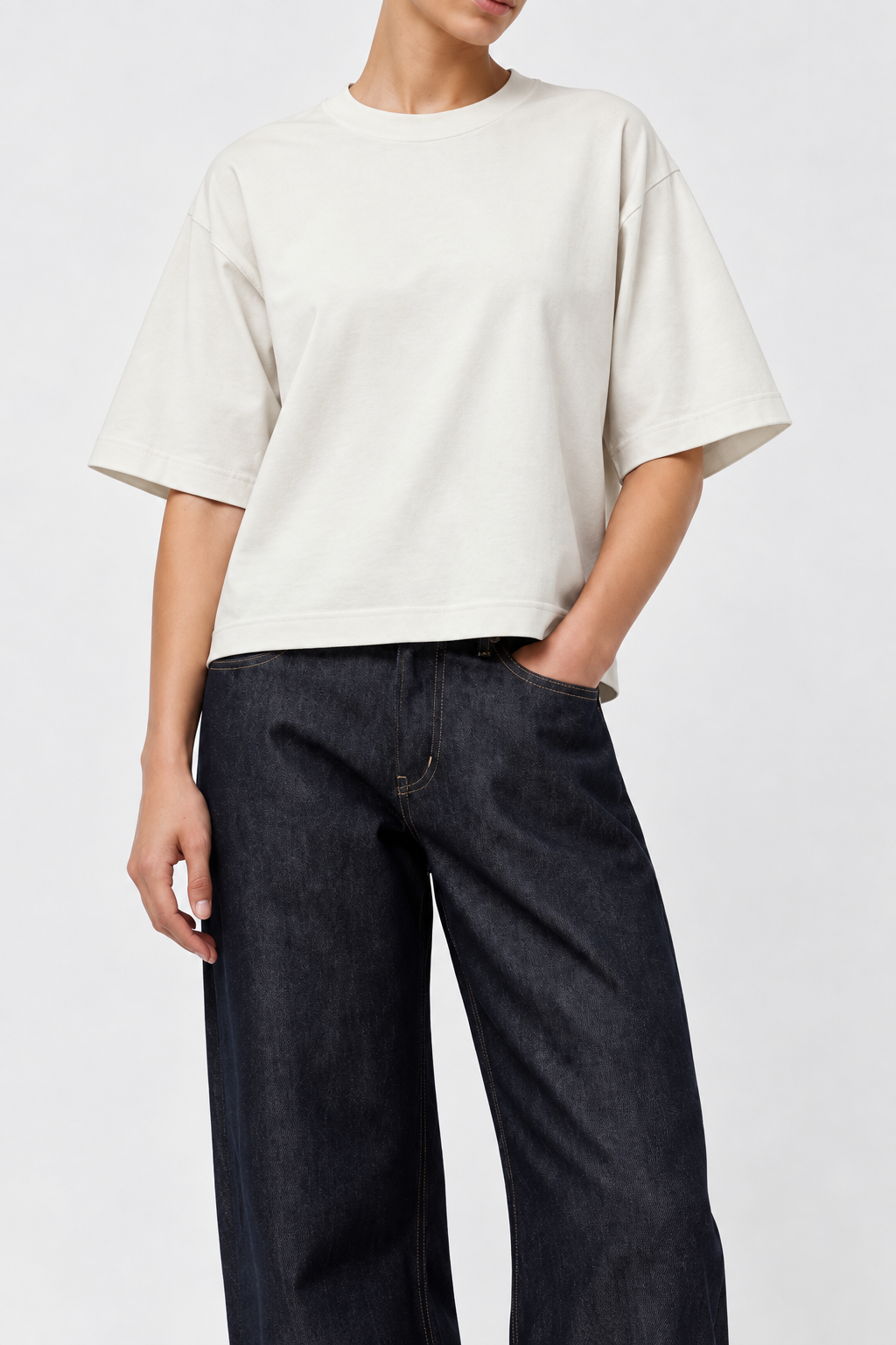 Model wearing the Sunray Sportswear Mahuna T-shirt in Off White and B Sides Floppy Jeans - East Coast General