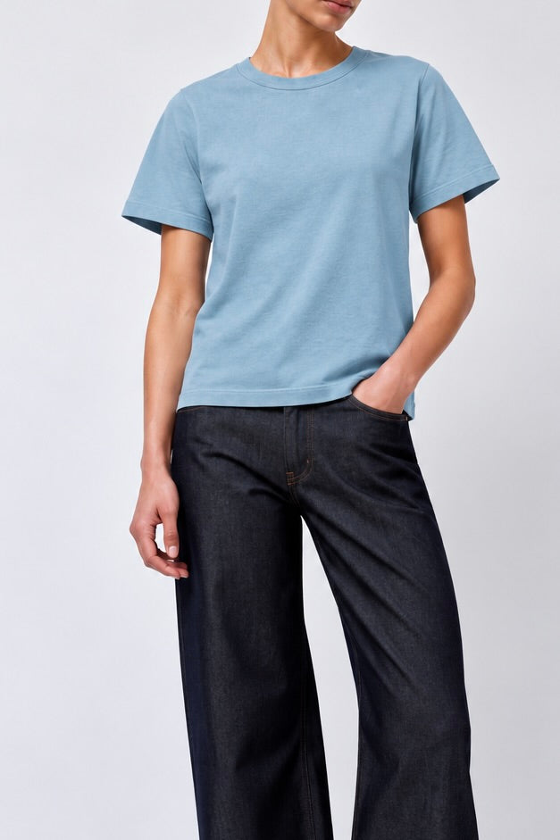 Model wearing Sunray Sportswear Na'maka'ah T-shirt in Smoke Blue with B-Sides Floppy jeans - East Coast General