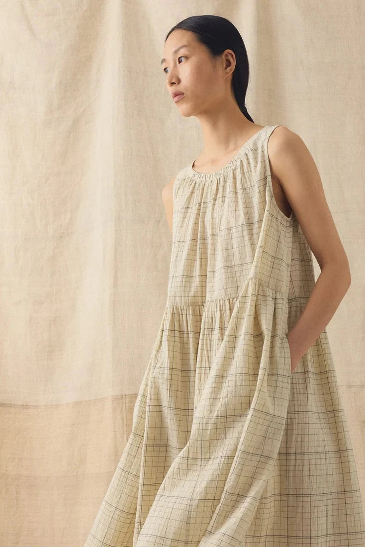 Side view of model wearing Toast Page Check Cotton Sleeveless Dress - East Coast General