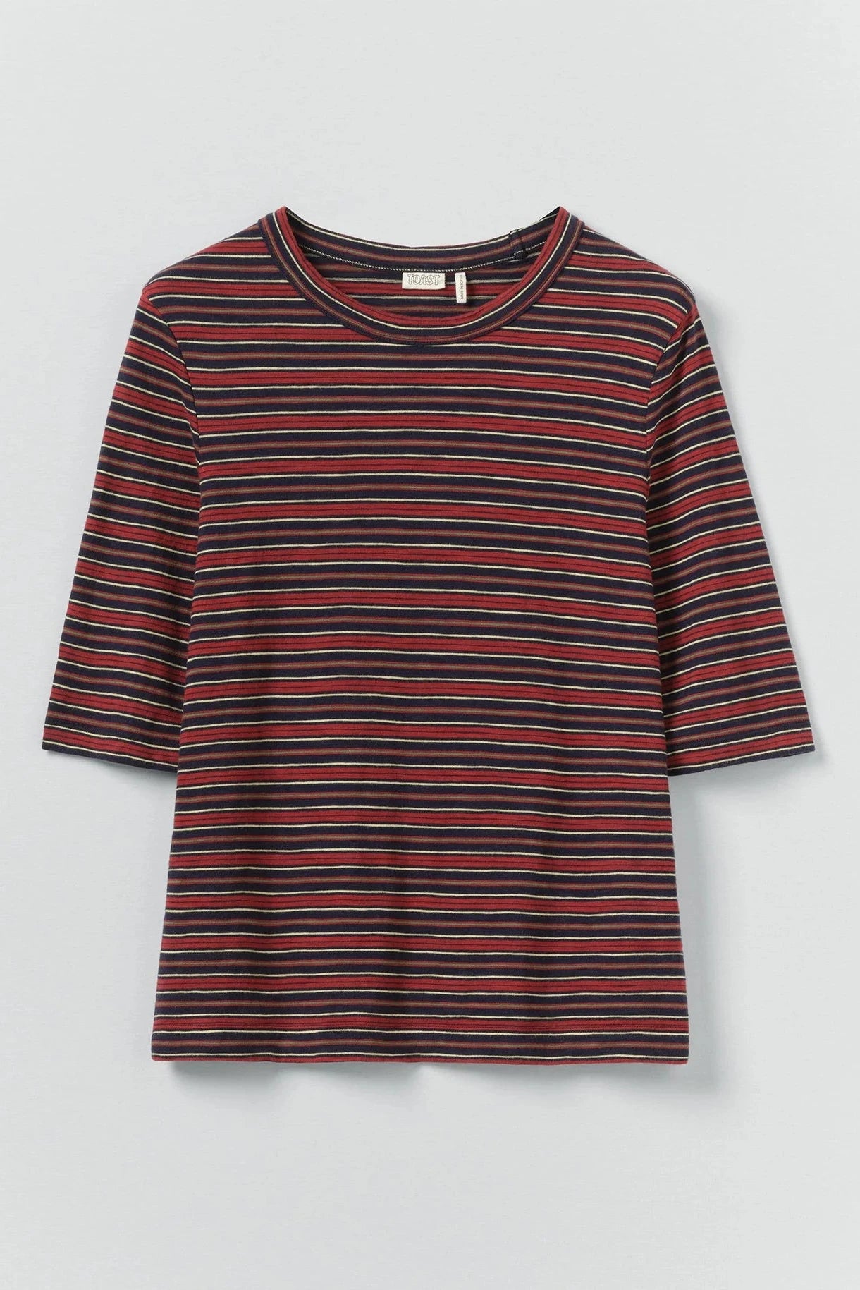 Striped shirt with red and black pattern on a light gray background