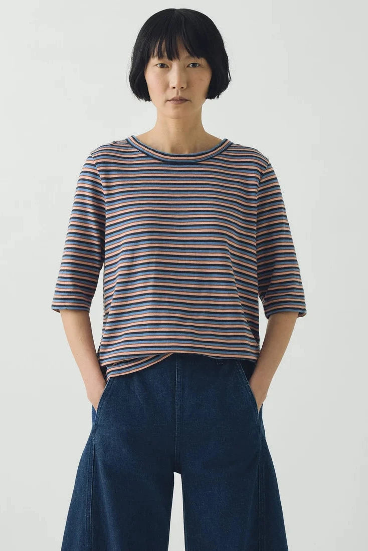 Front view of TOAST Cleo multi-stripe 3/4 sleeve cotton tee styled with dark wide-leg denim