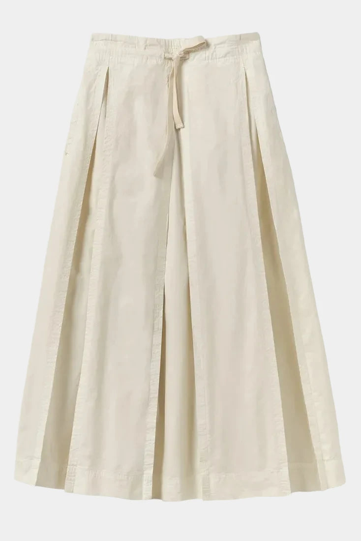 Flat lay of the TOAST ecru Cotton Linen skirt showing the drawstring waistband and clean pleat lines