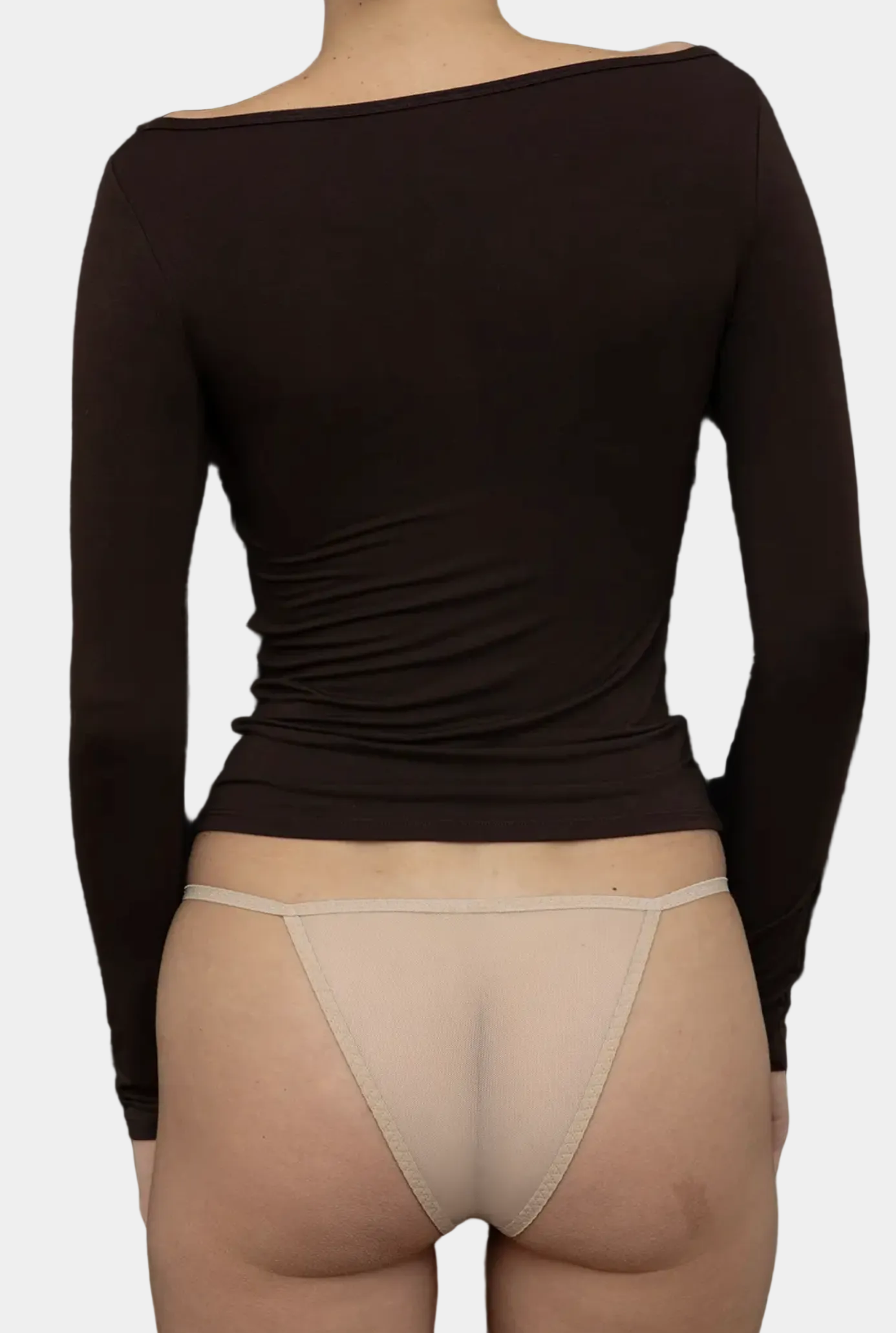 Model wearing KYE Intimates Recline Bateau Long Sleeve in Black boat neck top front view