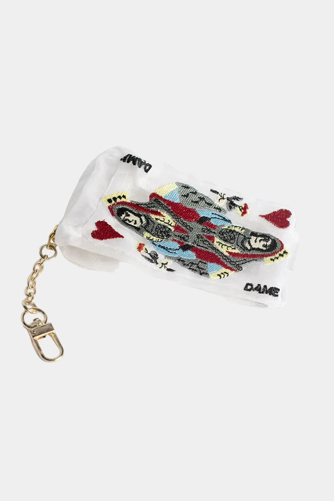 Small pouch with card design and chain on a white background