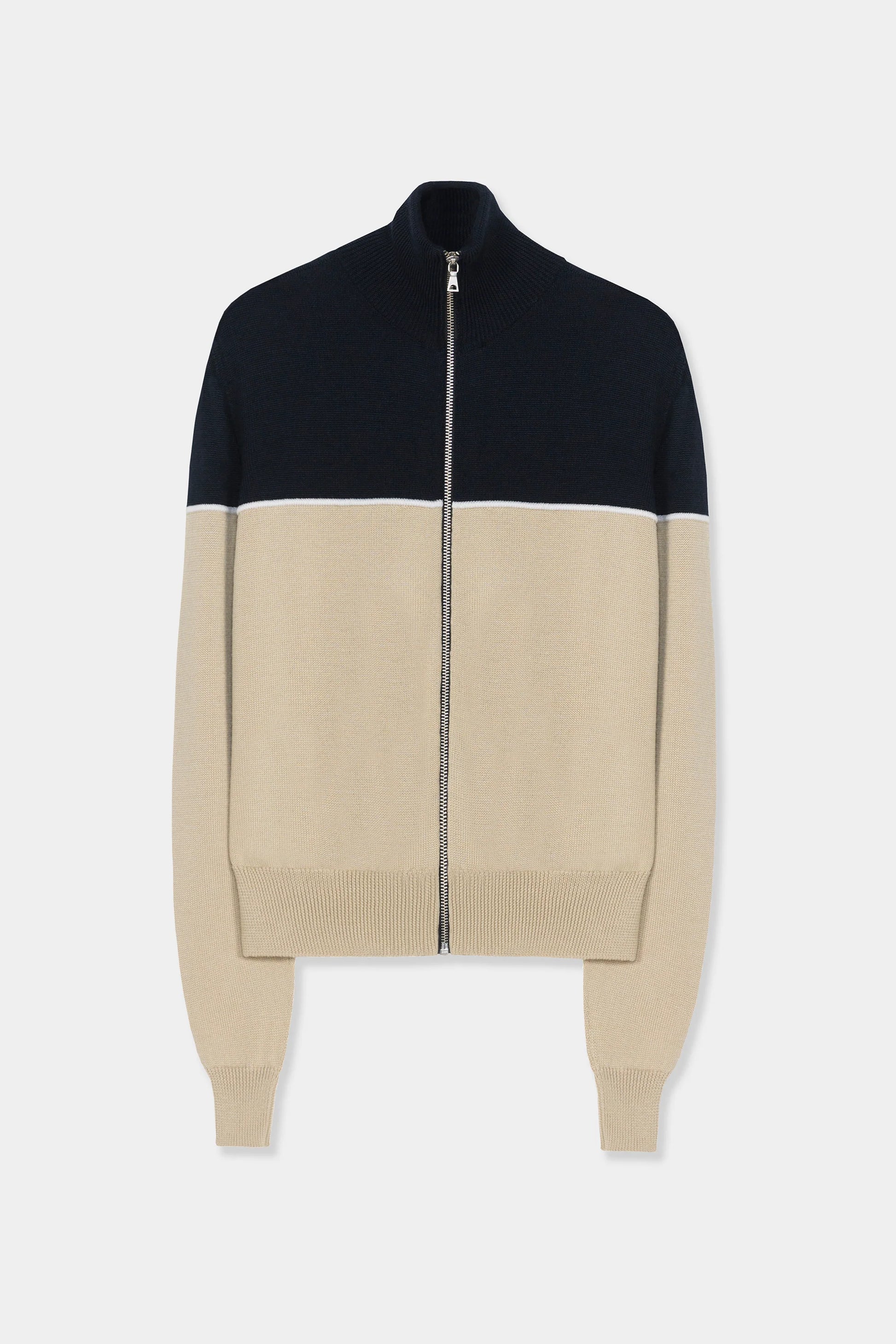 Colorblock merino wool zip through cardigan flat laid on a white background