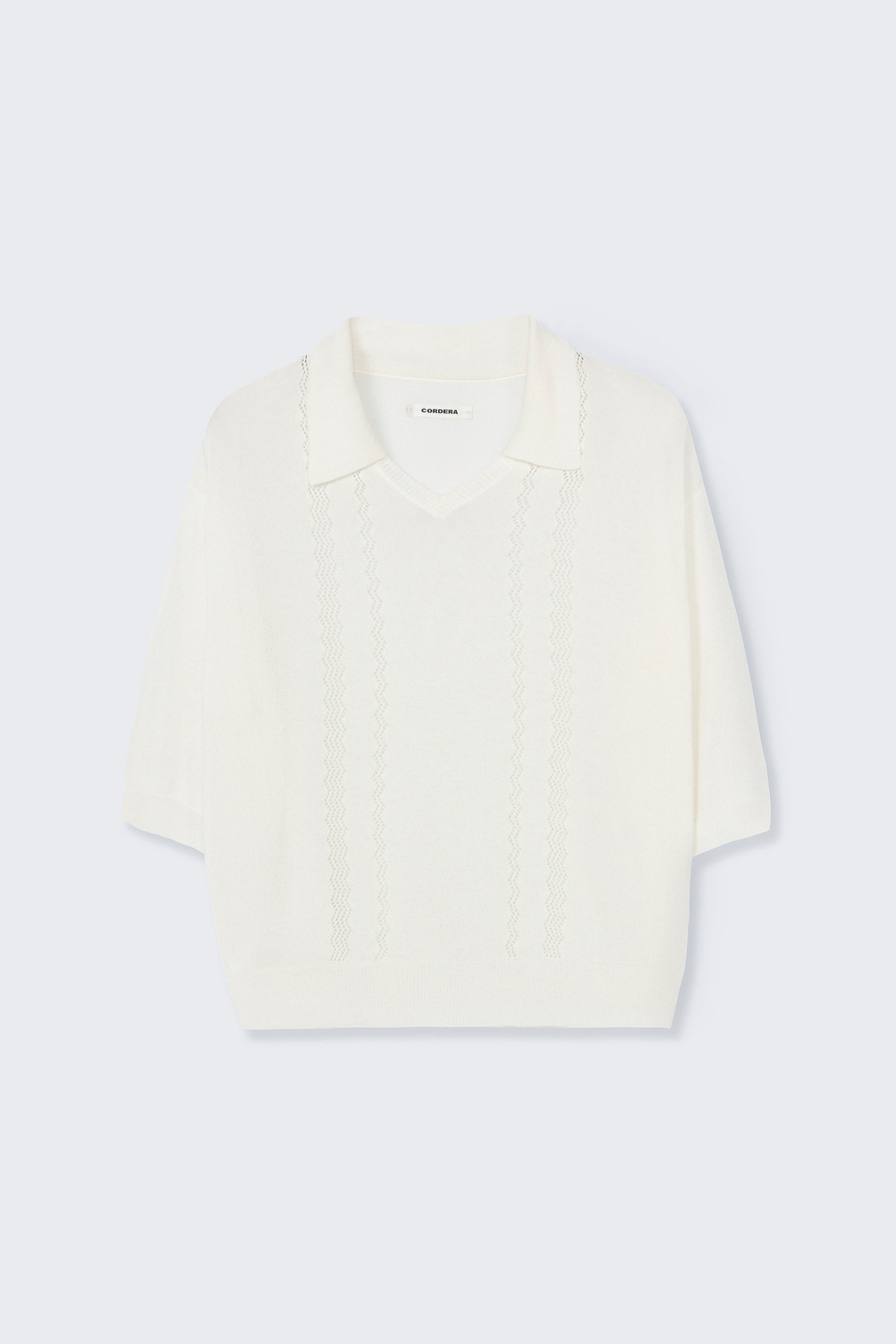 White blouse on a light gray background