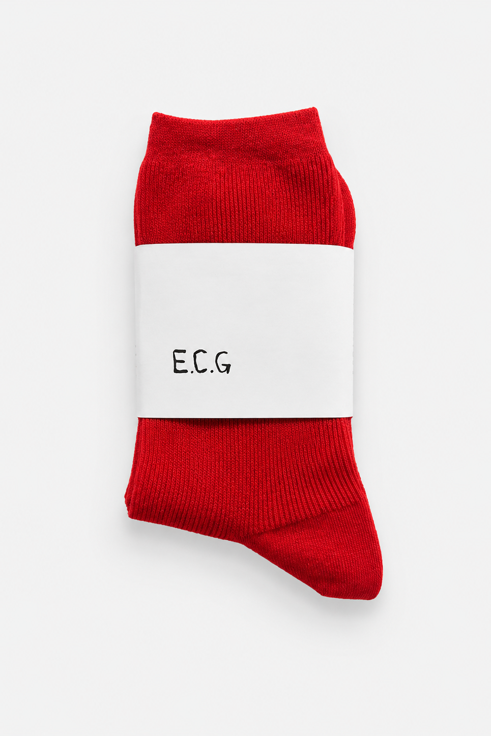 Red cotton socks with a white label displaying 'E.C.G.' on a light gray background - East Coast General