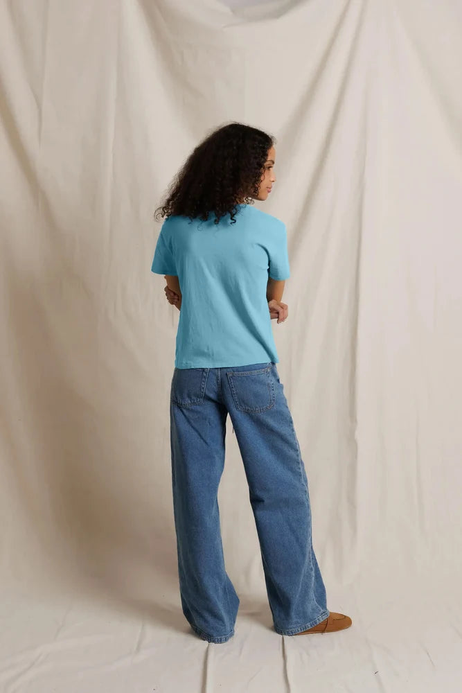 Rear view showing boxy fit and shoulders on Harley Tee milky blue by perfectwhitetee