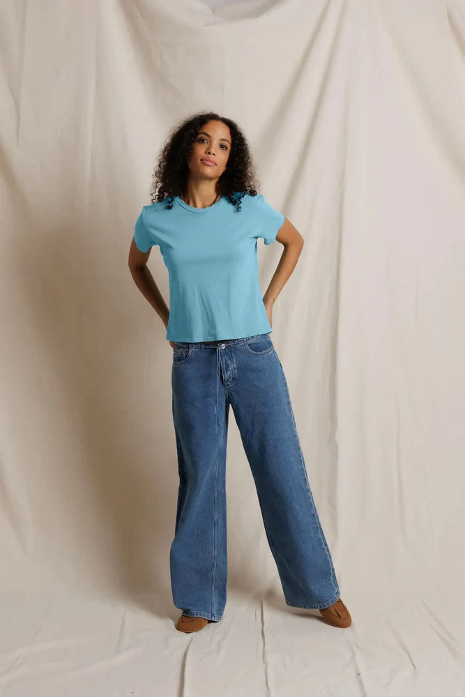Model wearing perfectwhitetee Harley Tee in milky blue boxy cotton shirt front view