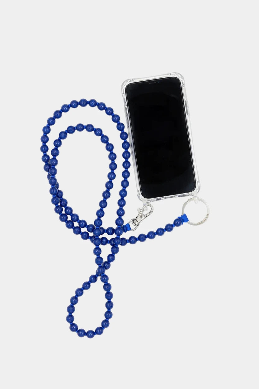 blue wooden beaded phone carrier attached to a phone displayed on a white background