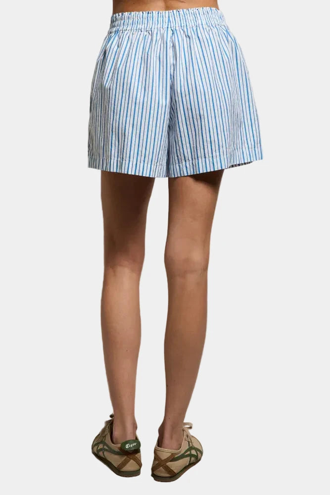 Model wearing perfect white tee Julie Stripe Cotton Poplin Short with elastic waistband at East Coast General