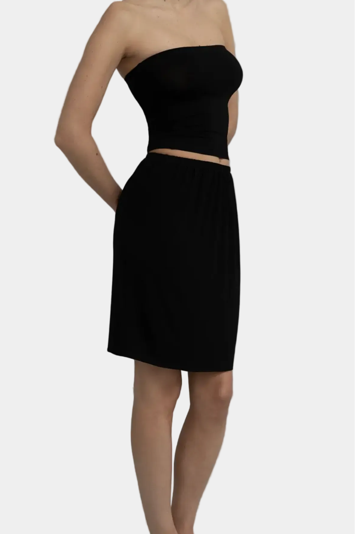 Side view showing drape and bias cut movement on KYE intimates Black Recline Skirt - East Coast General