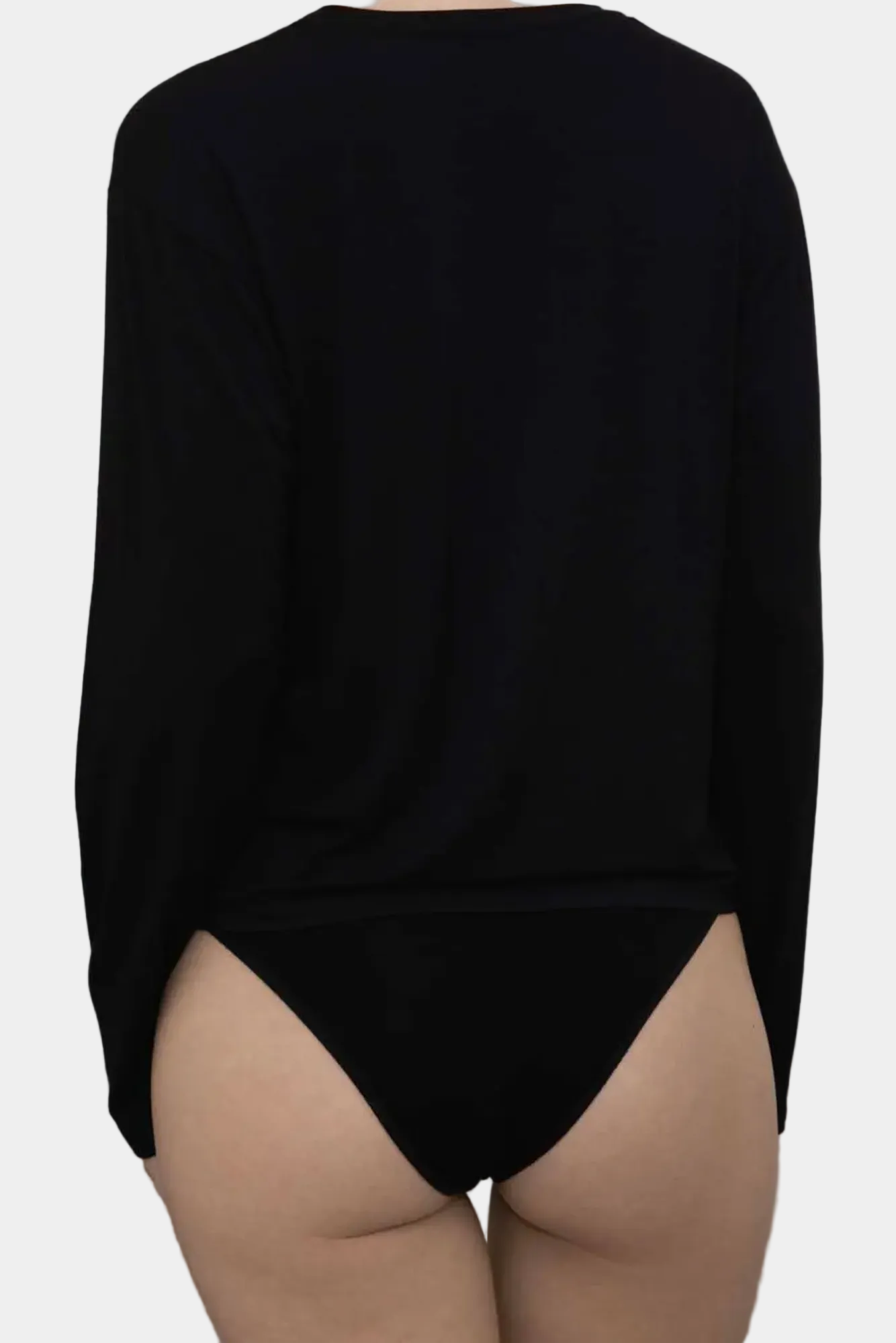 Model wearing KYE Intimates Relaxed Long Sleeve in Black slouchy bamboo top rear view - East Coast General