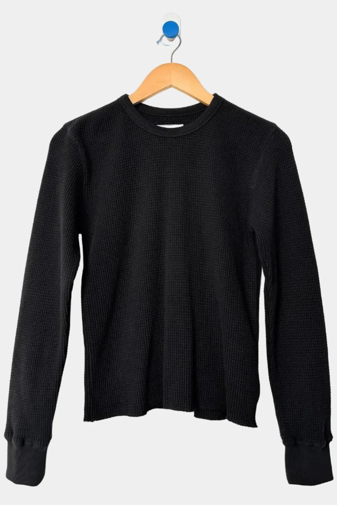 Le Bon Shoppe Waffle Fundamental Tee in True Black hanging on wooden hanger