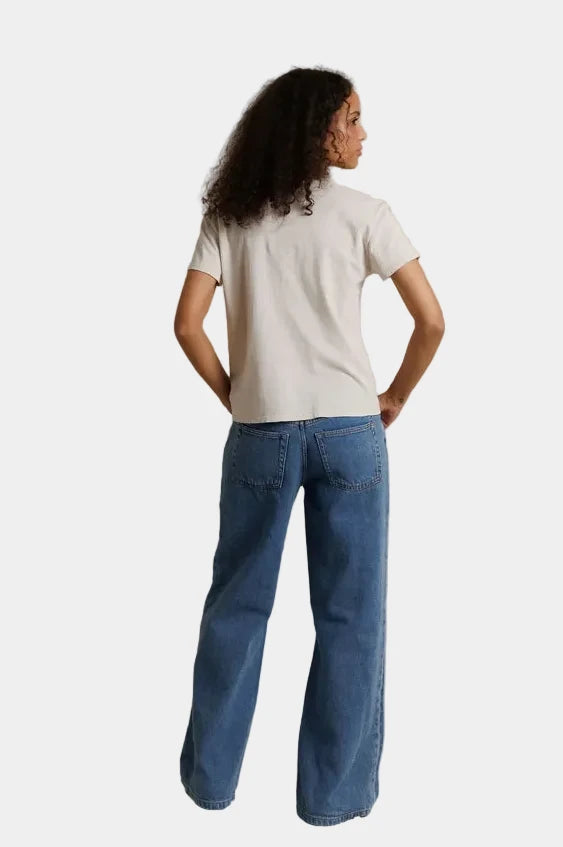 Back view of model wearing perfectwhitetee Lisa cotton tee in Whitecap Grey showing hem length