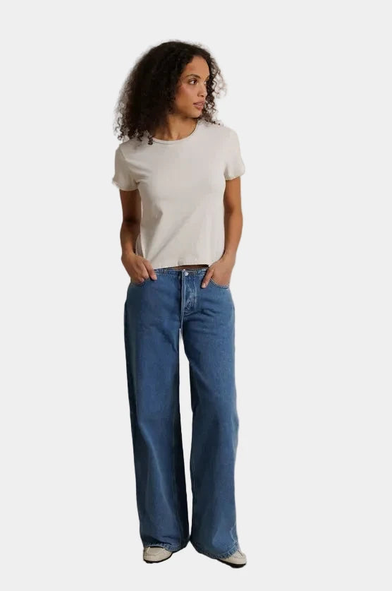 Front view of model wearing perfectwhitetee Lisa Tee in Whitecap Grey styled with wide leg jeans