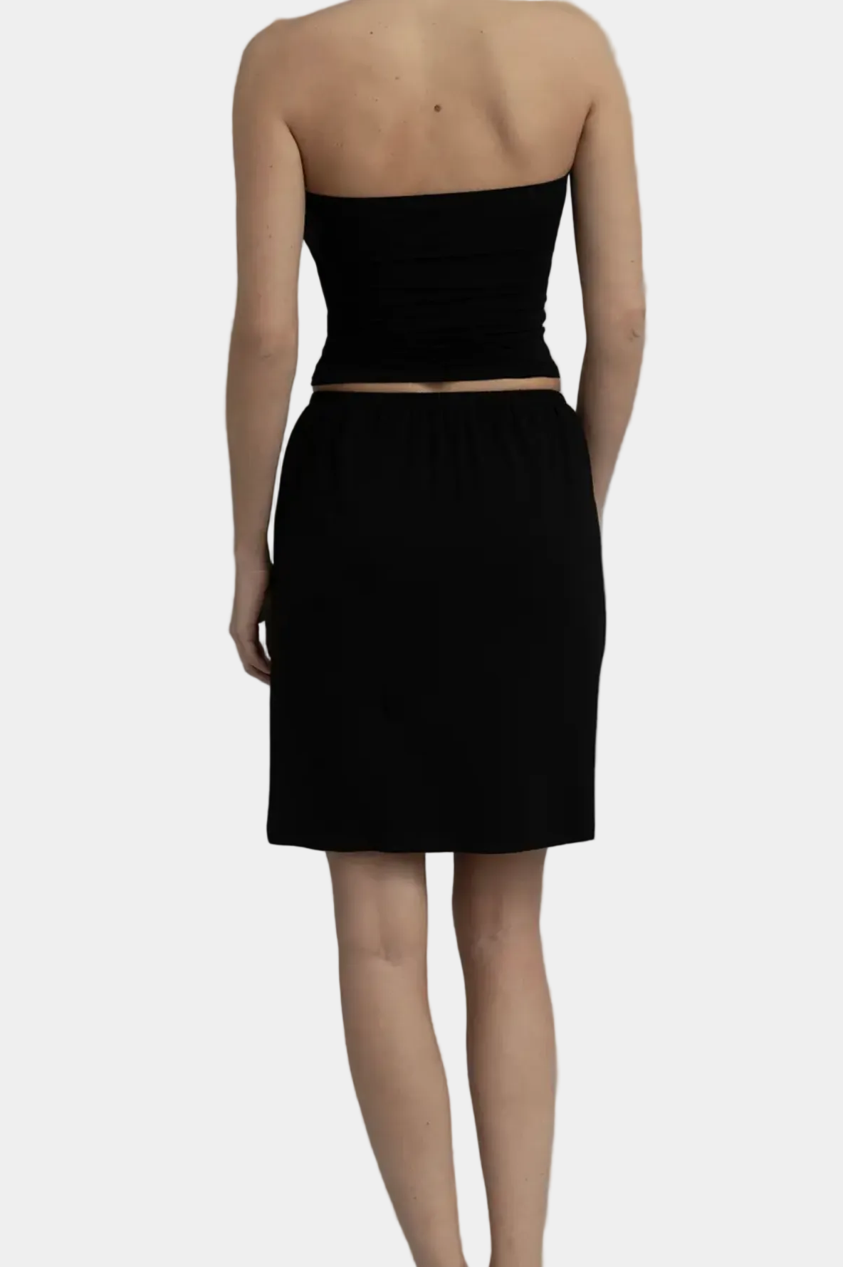 Model wearing KYE intimates Recline Skirt in Black fluid column maxi skirt front view - East Coast General