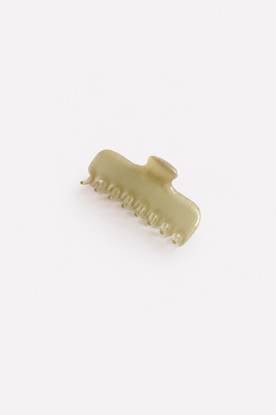 Sage green hair claw clip on a plain light grey background - East Coast General