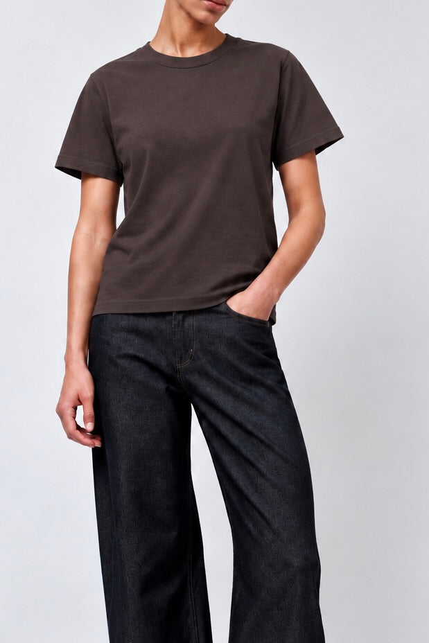 model wearing sunray sportswear na'maka'oh t-shirt in raisin and b-sides floppy jeans - East Coast General