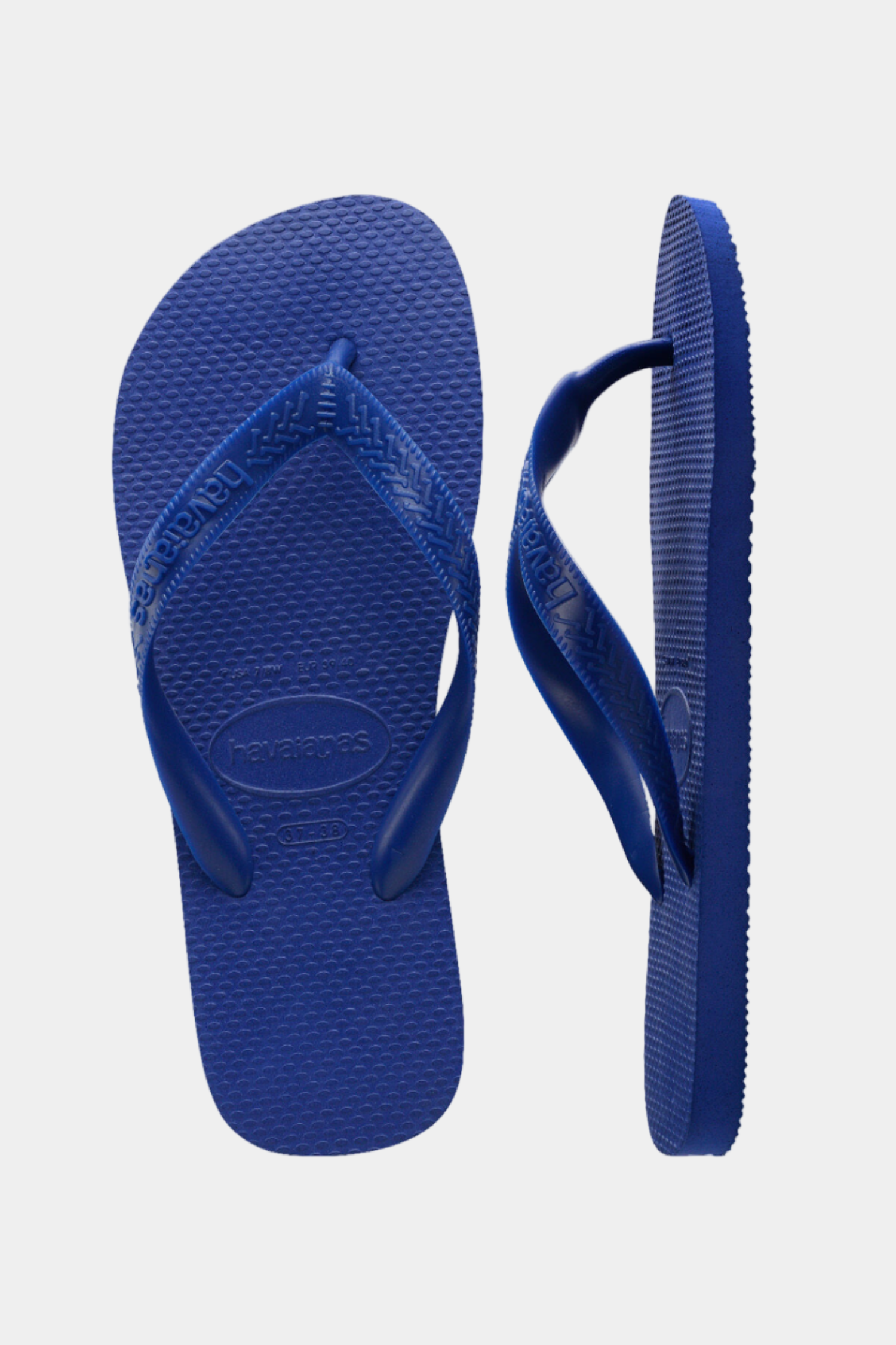 Blue flip-flops on a white background